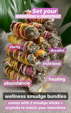 a stack of candy sticks with the words, set your intention & manifist