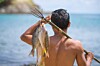 Man with spear and fish