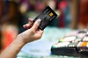 A person presenting a credit card