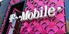 T-Mobile logo on the side of a pink building