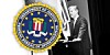 FBI director Christopher Wray giving a speech with the FBI seal in view