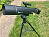 Telescope on tripod in a garden