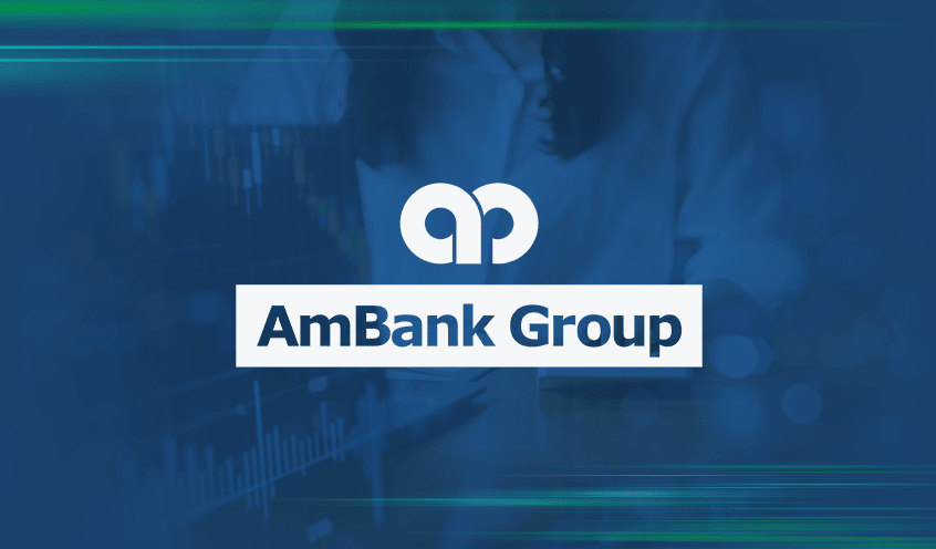 A background image of a woman studying a financial analysis chart displayed on her laptop with a blue overlay features the AmBank logo in white at the center.