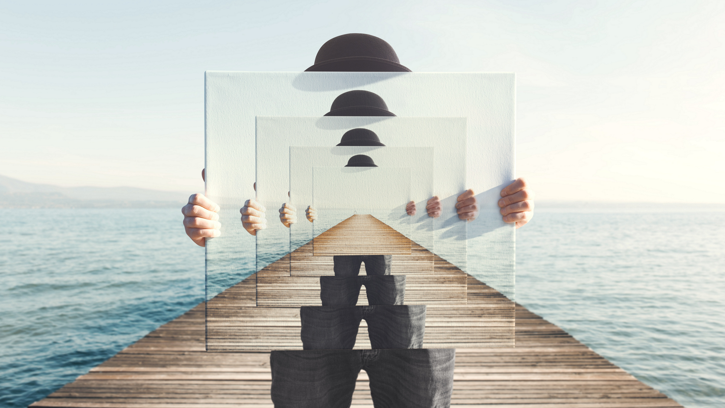 surrealistic image of figure holding an infinity mirror