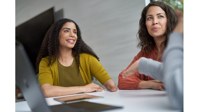 Work colleagues talking.
