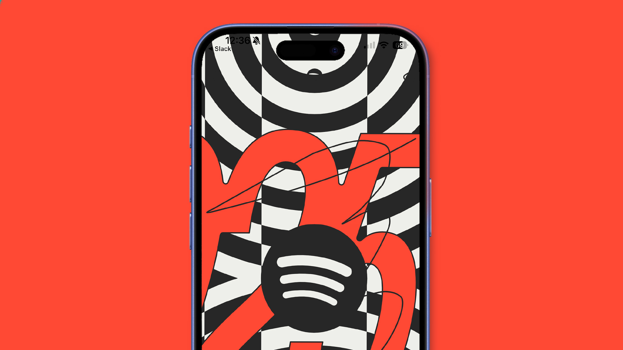 A phone on a red background showing the Spotify Wrapped 2025 main screen