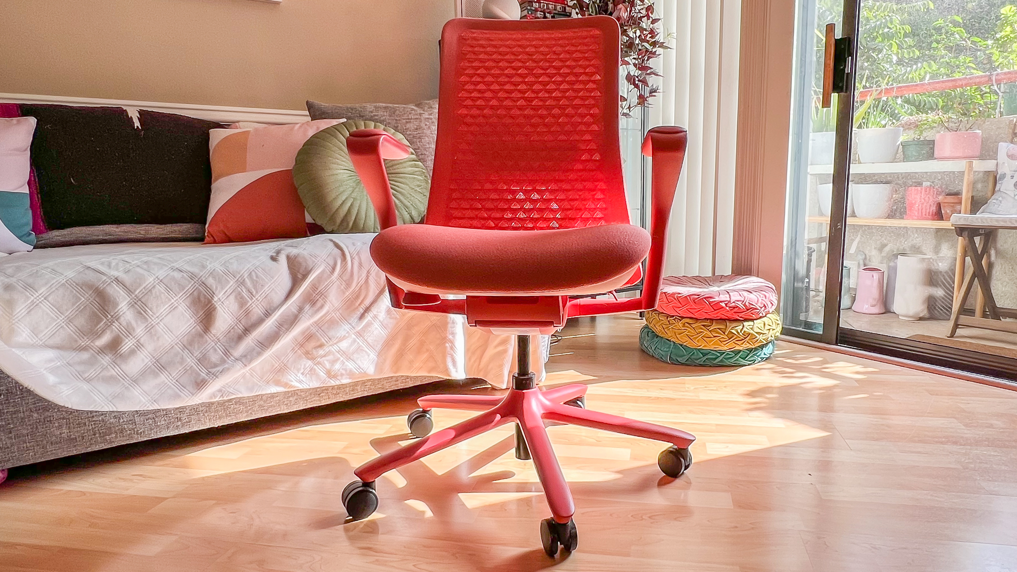 Coral Branch Verve office chair in a bright room with wood panelled flooring