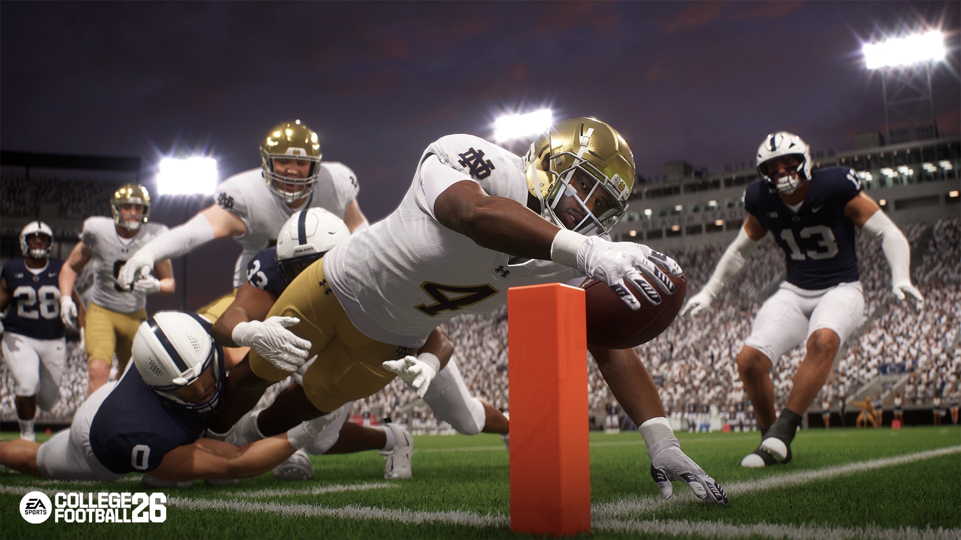 A dynamic in-game moment where a player is reaching for the touchdown while evading defenders on the field. 