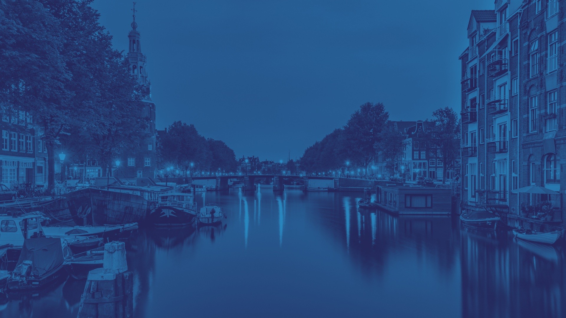 People sitting and listening to a speaker