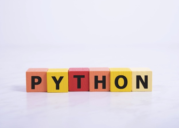 Colorful wooden blocks spelling 'python'