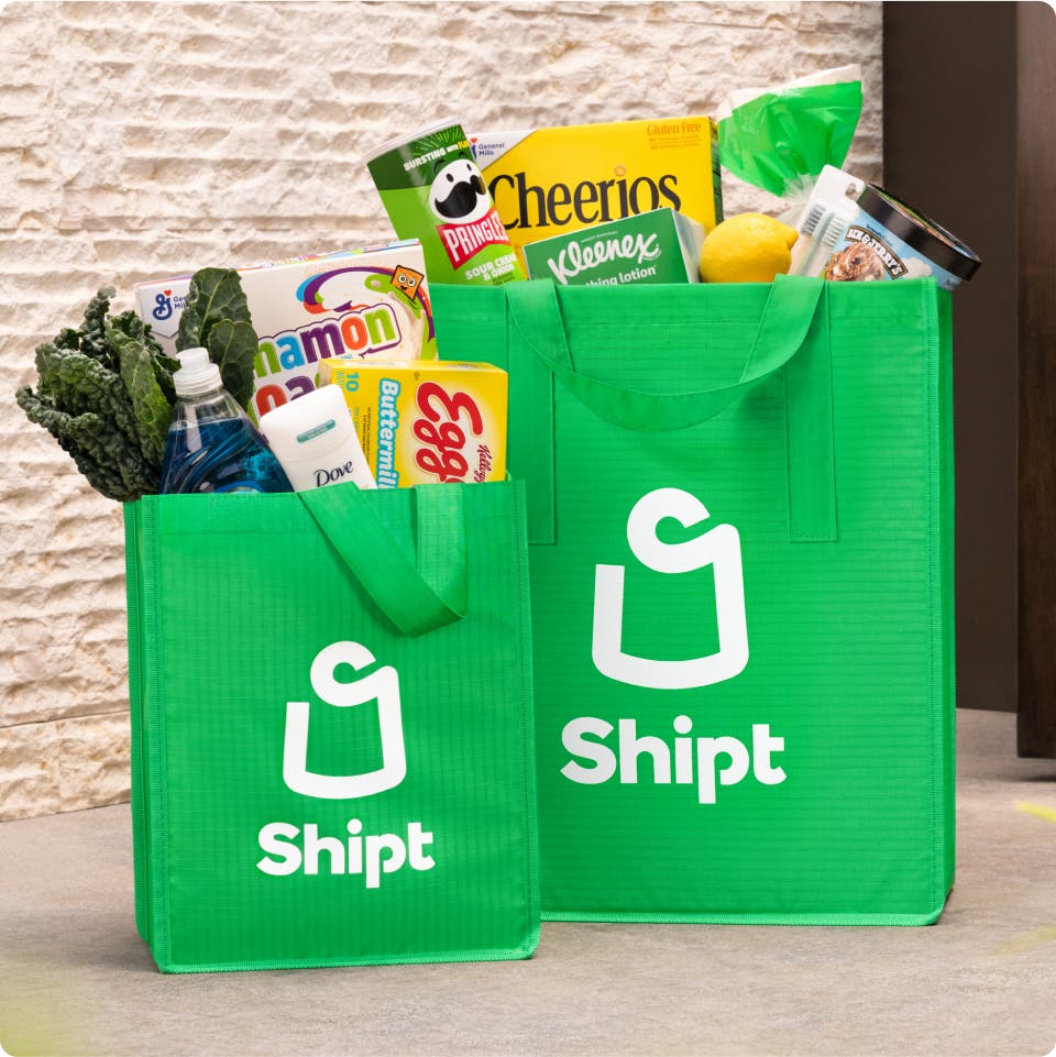 2 bags of Shipt groceries on a door step