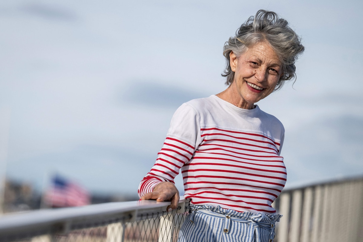 President of the Breakthrough Award Jury Portuguese-Belgian singer and actress Lio poses for pictures at the top of the Pavillons des Bains, during a photocall as part of the 52nd edition of the Deauville American film festival, in Deauville, northwestern France on September 7, 2026. (Photo by Guillaume SALIGOT / AFP)