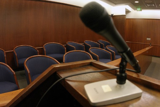 Tweeting Jurors Fines FILE - An empty jury box in a courtroom in Santa Maria on Jan. 30, 2005. Jurors are paid $15 a day. Pool (Spencer Weiner/Los Angeles Times via AP, Pool, File)